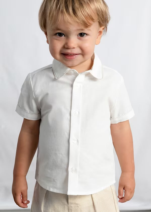 Close-up of the Mayoral oat-check shorts fabric and waistband