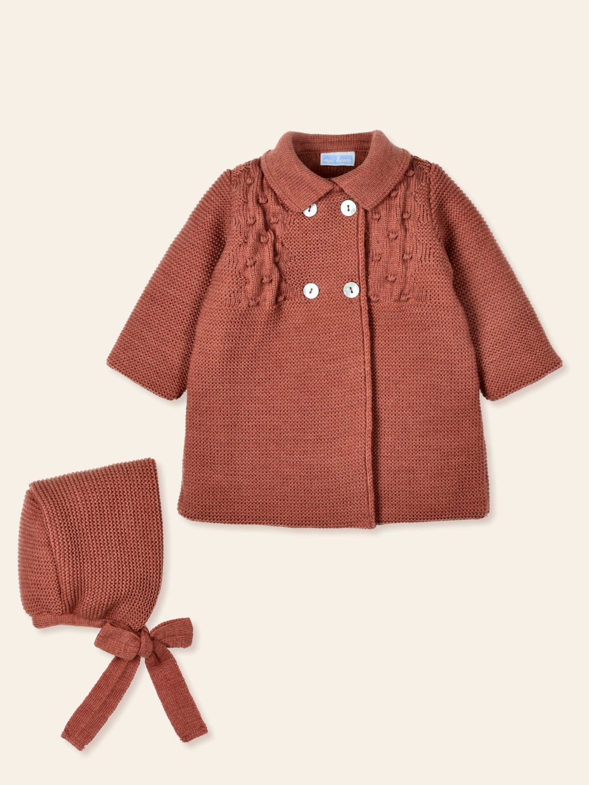 MAC ILUSION AW24 Acariciar Unisex Rust Knitted Coat & Bonnet - CLEARANCE SALE