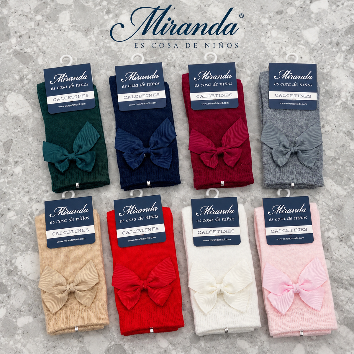 Miranda girls knee-high socks with grosgrain bows in bottle green, navy, burgundy, grey, camel, red, cream and pink.