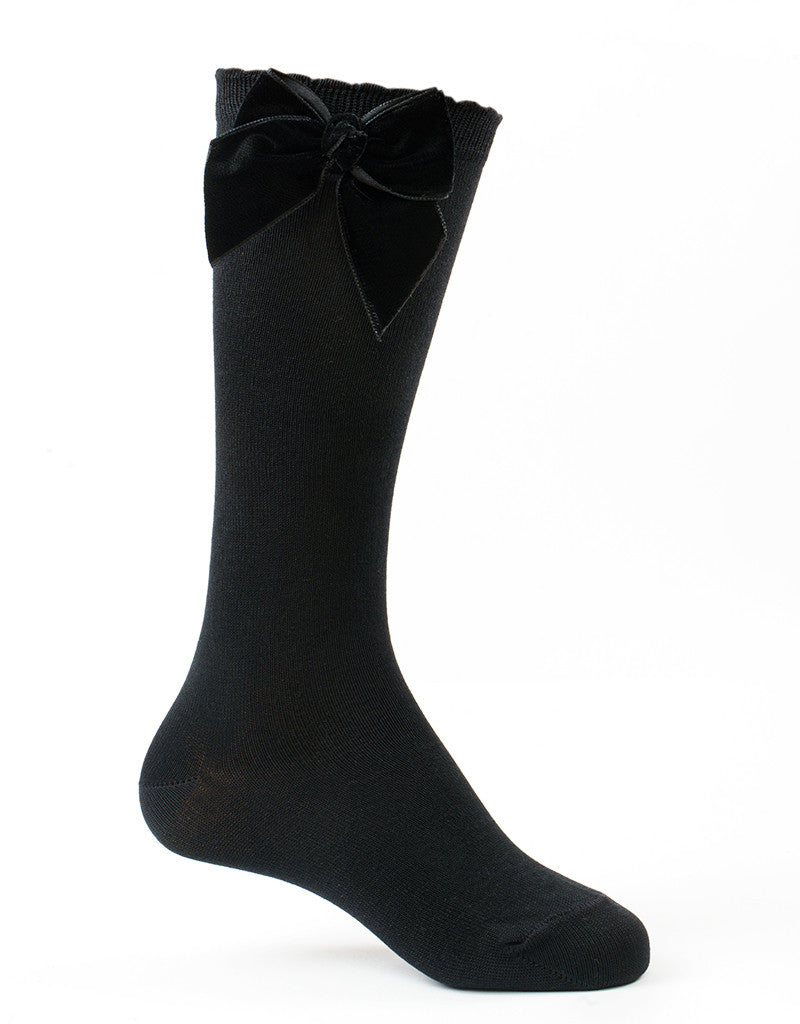 black knee-high socks for girls with velvet bow detail by JC Castella