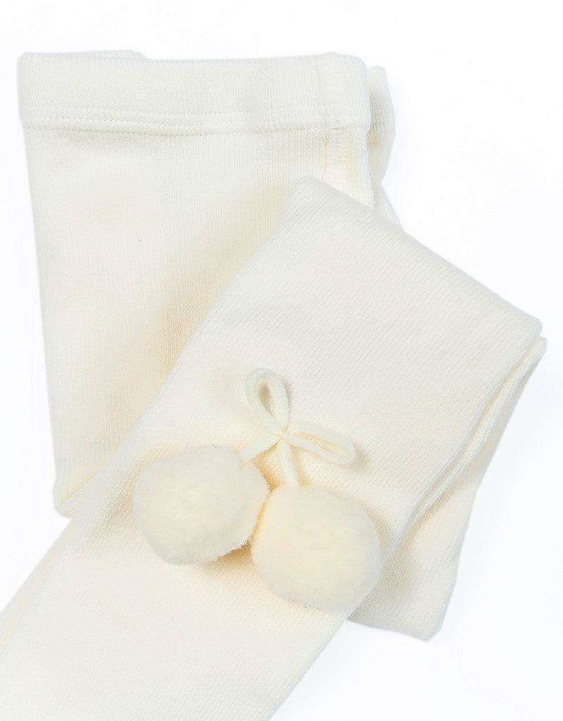 cream girls tights with decorative pom-pom details by JC Castella