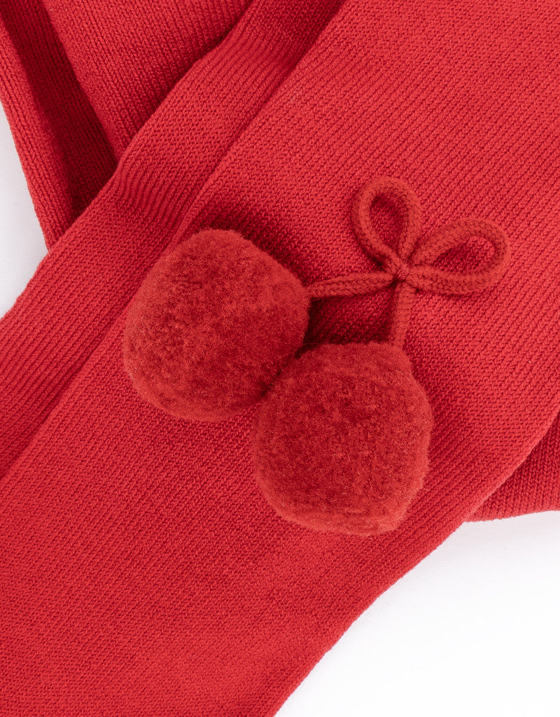 red girls tights with decorative pom-pom details by JC Castella