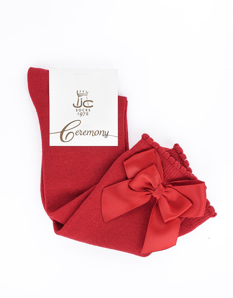 red knee-high socks for girls with double satin bows by JC Castella