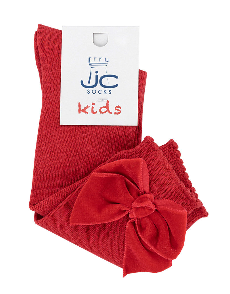 red knee-high socks for girls with velvet bow detail by JC Castella