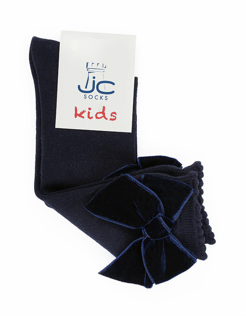 navy knee-high socks for girls with velvet bow detail by JC Castella