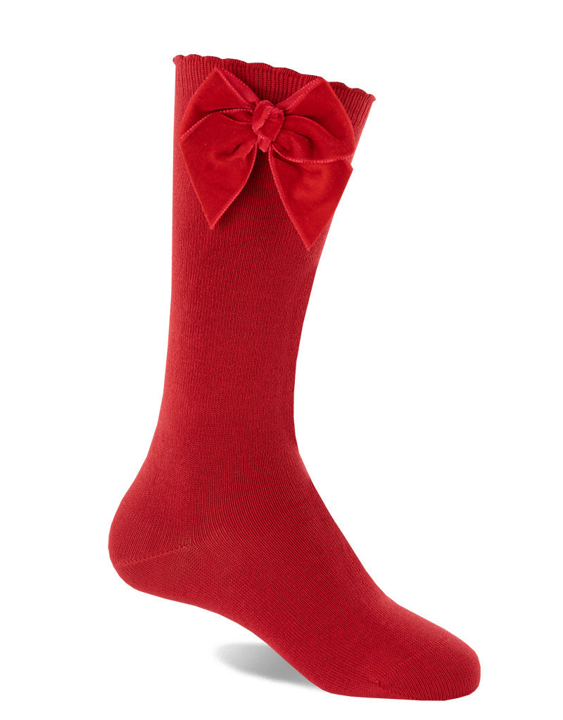 red knee-high socks for girls with velvet bow detail by JC Castella