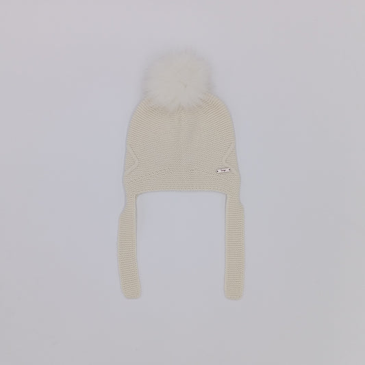 Rahigo cream knitted hat with ear flaps, tie fastening and real fur pom pom, made in Spain.