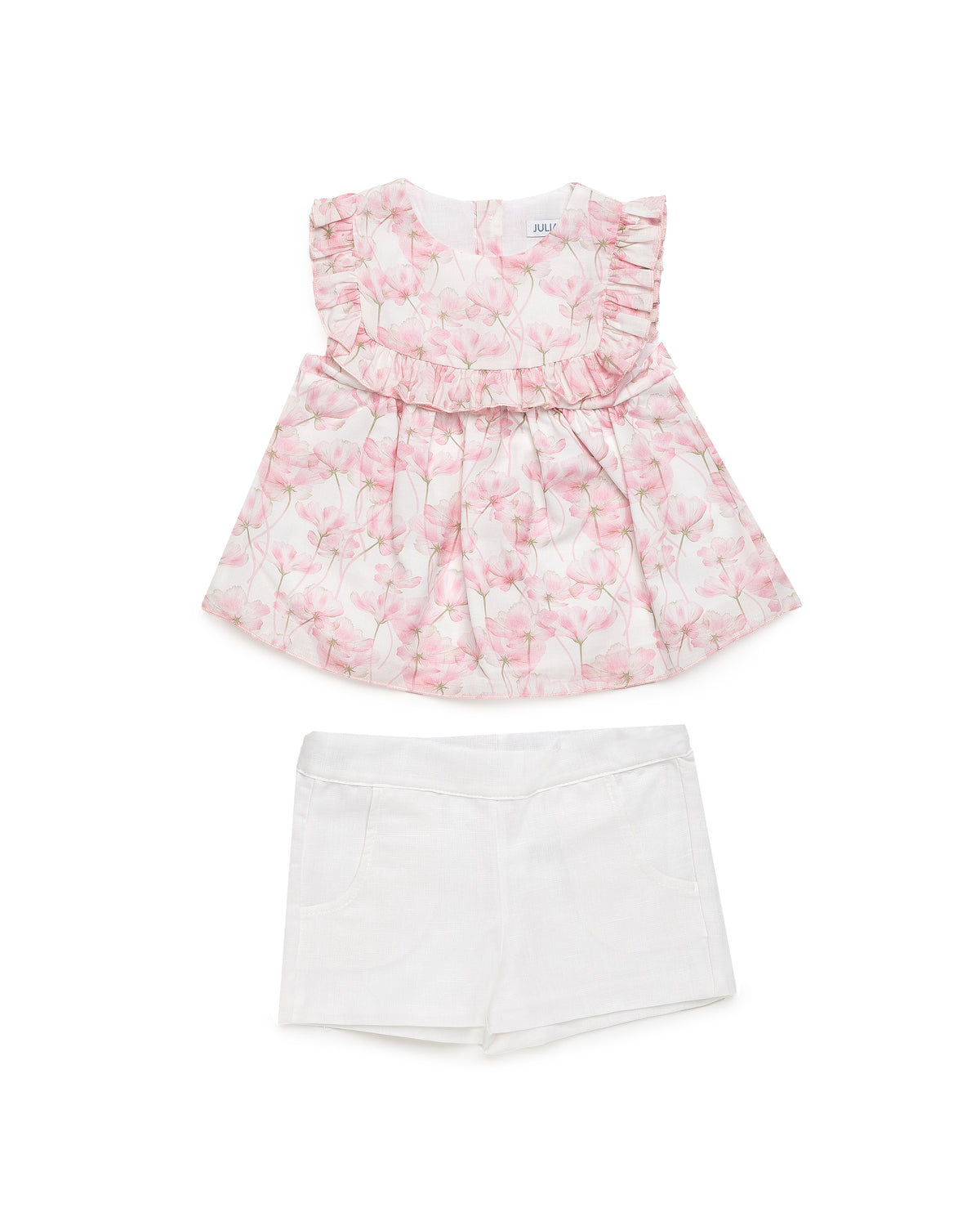 Juliana Caramelo girls pink floral top and white tailored shorts set, front view.