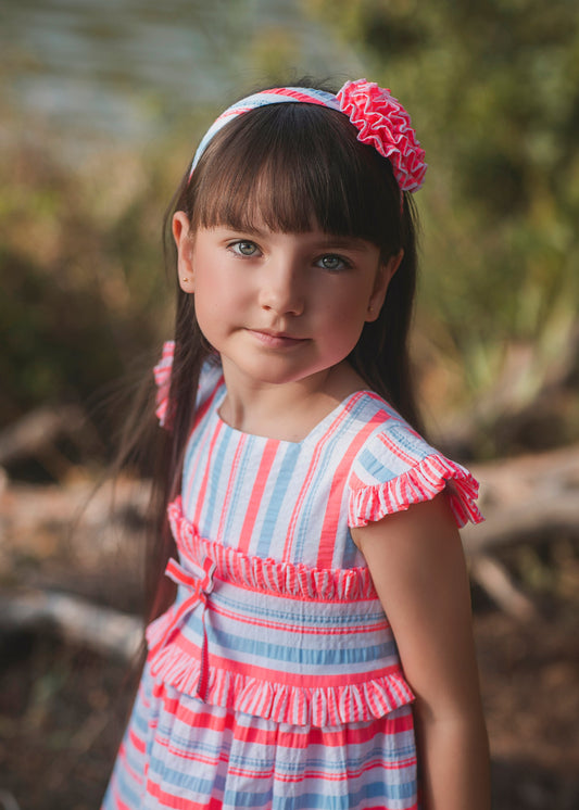 Rochy Fluor girls blue and neon pink striped headband with ruffle flower detail
