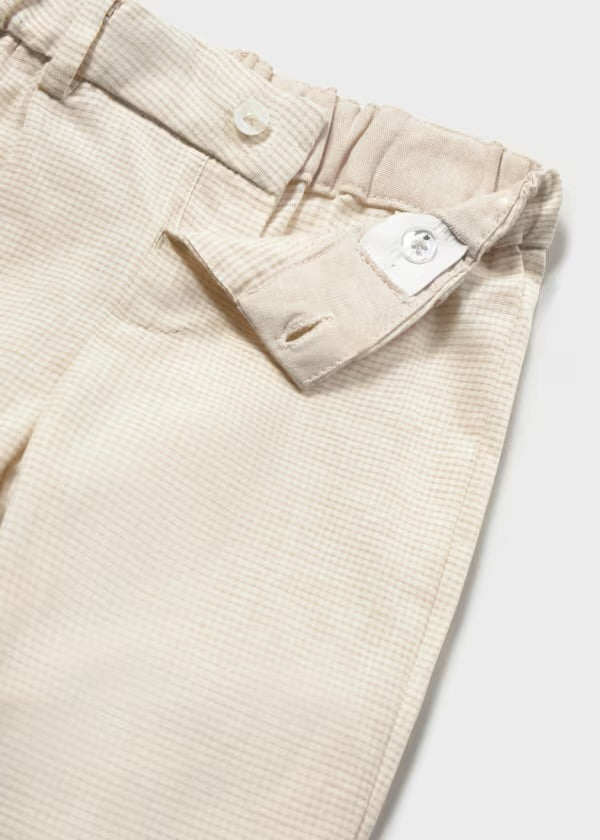 Close-up of the Mayoral checked trouser waistband and belt loops