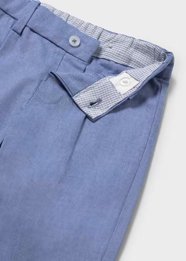 Close-up of the Mayoral Capri-blue trouser waistband and button fastening