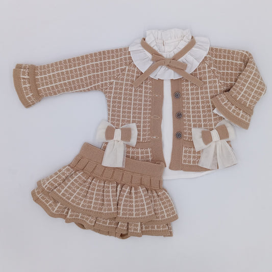Rahigo camel and cream girls three piece knitted skort set with cardigan, ruffle collar top and layered skort featuring tulle bows.
