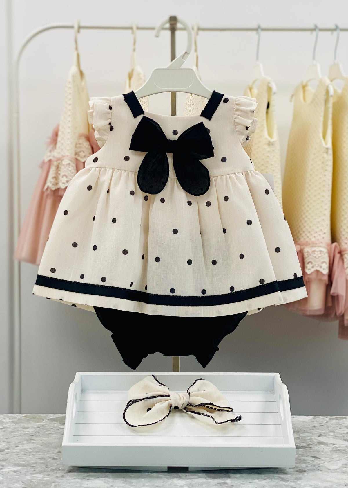 Basmarti Coco girls cream and black polka dot dress with matching knickers
