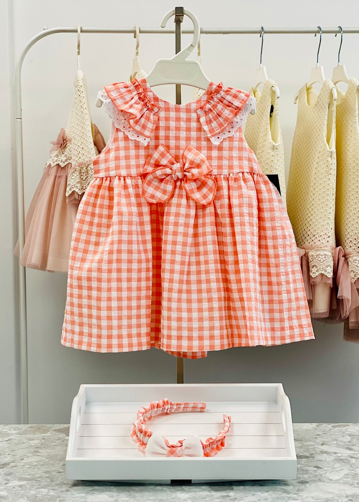 Basmarti Lola coral gingham girls dress with broderie anglaise detail