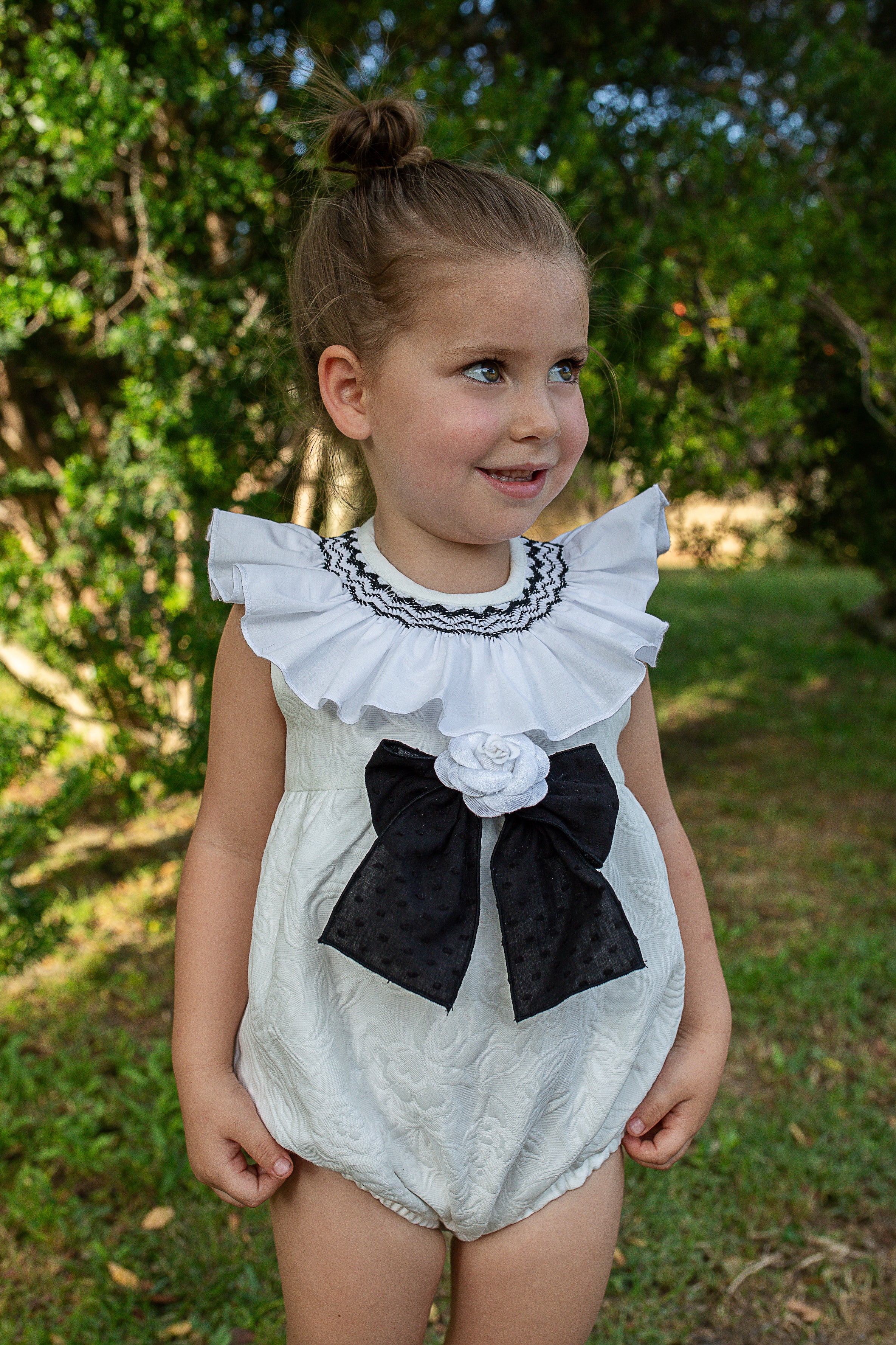 PRE ORDER NAXOS Camelia Girls Black & White Jacquard Smocked Romper - 7700