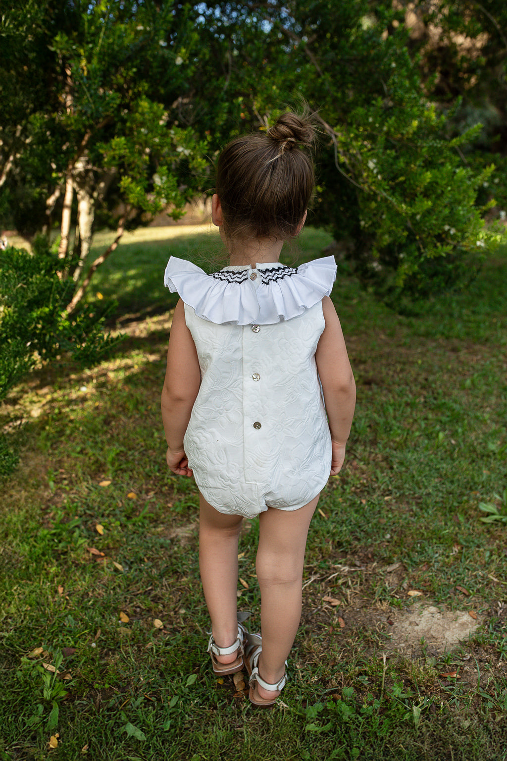NAXOS Camelia Girls Black & White Jacquard Smocked Romper - 7700