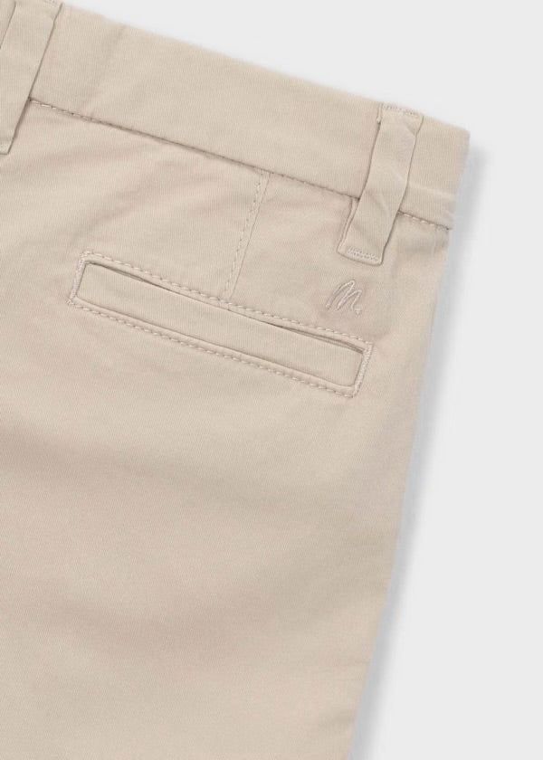 Close-up of the Mayoral beige chino shorts waistband, belt loop and back pocket