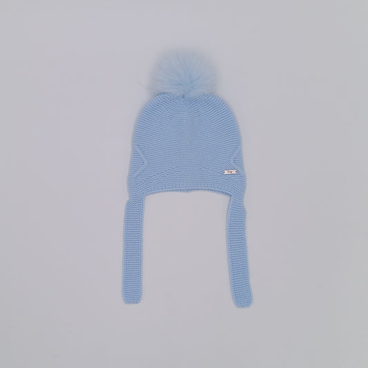 Rahigo baby blue boys knitted hat with ear flaps, tie fastening and real fur pom pom, made in Spain.