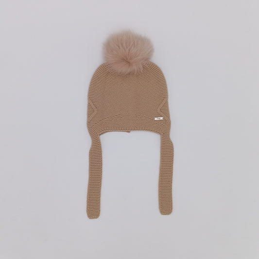 Rahigo camel knitted hat with ear flaps, tie fastening and real fur pom pom, made in Spain.