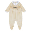 Blues Baby Silves boys beige cotton velour babygrow with smocked soldier and drum embroidery and white collar