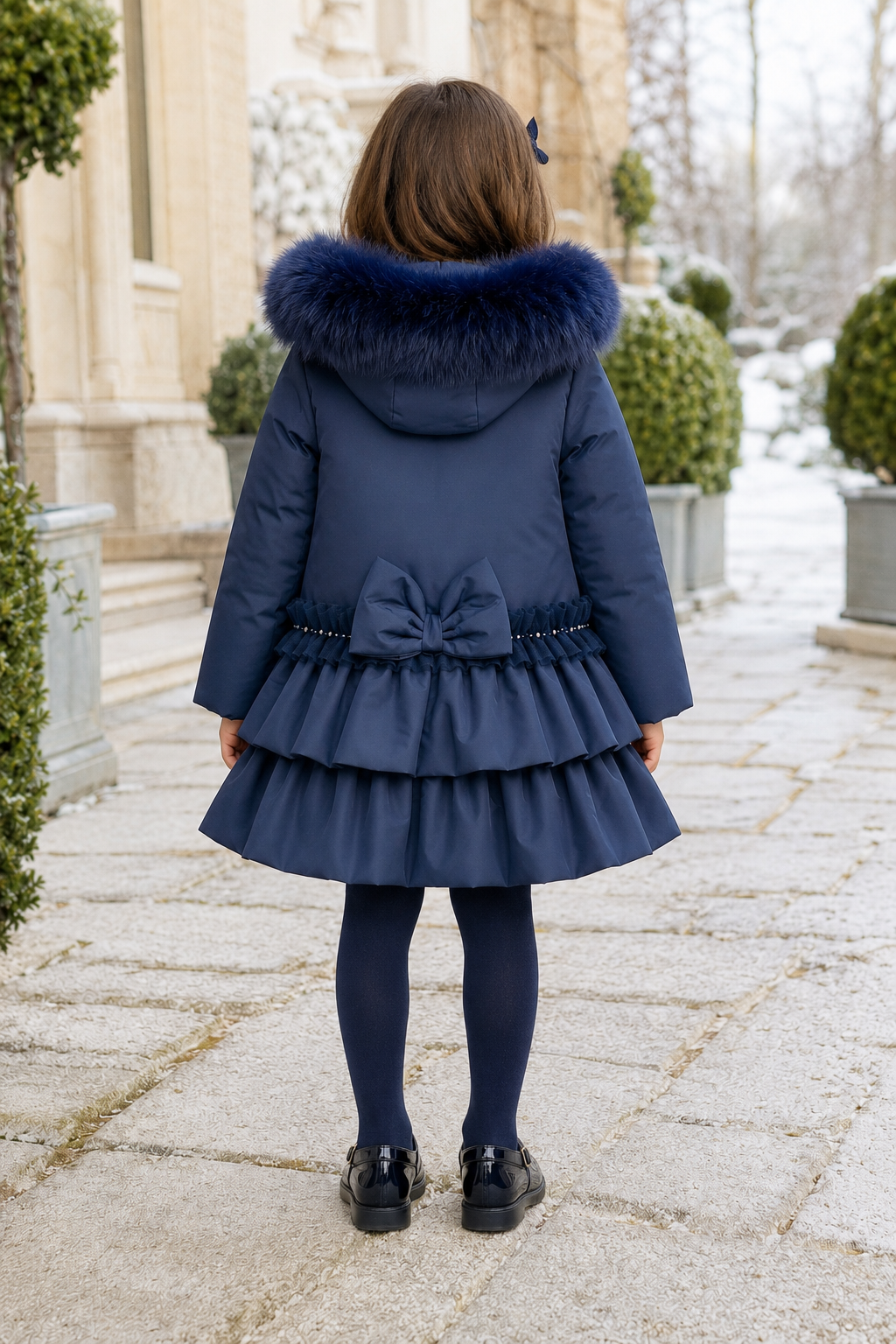 Bimbalo girls navy padded winter coat with fur hood pearl trim and statement back bow - back view