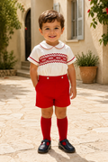 NAXOS Pablo boys red short set with ivory hand-smocked shirt, red piping and tailored red shorts. - lifestyle