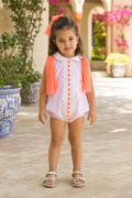 Naxos Neon girls pink romper with white lace detailing, neon orange tulle shoulder bows and pom pom trim.