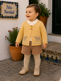 Baby boy wearing Tutto Piccolo camel and mustard short set with bear cardigan in Spain