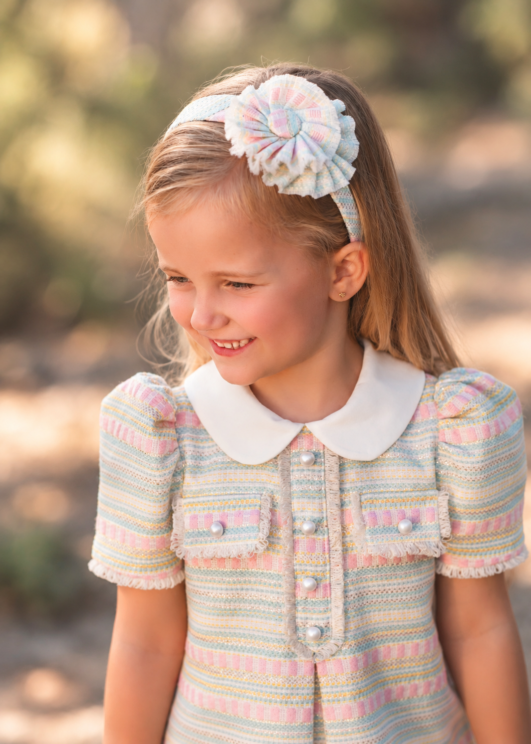 Rochy Jacquard girls multicolour tweed dress with white Peter Pan collar, pearl button details and matching pastel headband