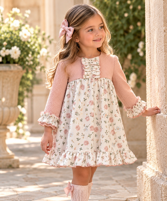LOR Miral Freya girls blush pink and ivory floral dress with ruffled front, long sleeves and frill hem displayed on a hanger