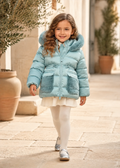 Girl in Spain wearing the Abel & Lula aqua green satin padded coat - 5849