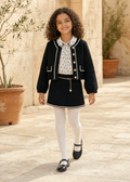 Girl in Spain wearing the Abel & Lula black skirt set with jacket - 5843