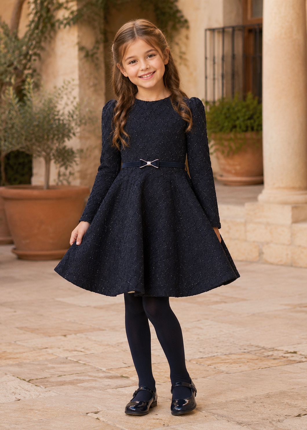 Girl wearing the Abel & Lula navy boucle jacquard occasion dress - 5535