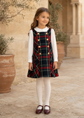 Girl wearing Abel & Lula navy tartan pinafore dress and ivory blouse