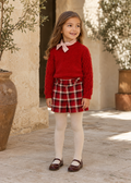 Girl wearing Abel & Lula red jumper, bow-neck top and plaid shorts - 5827