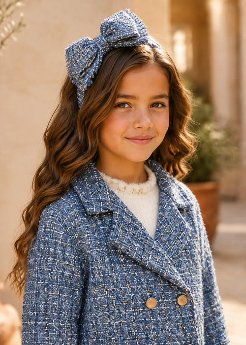 Girl wearing Abel & Lula sky blue tweed bow headband - 5973