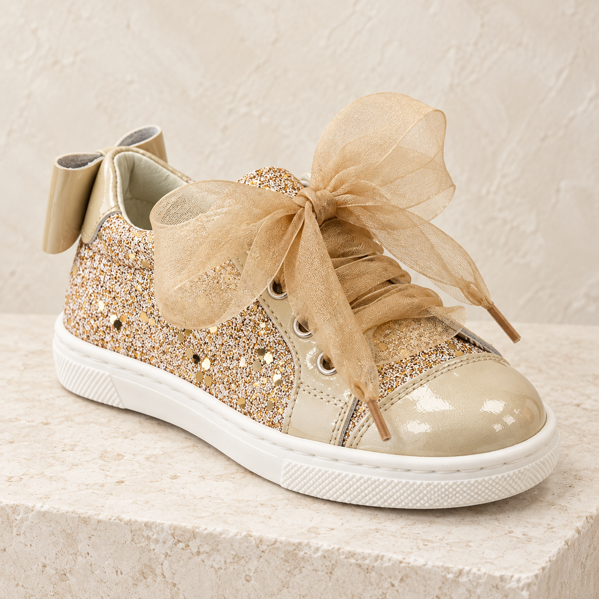 Andanines beige pearl patent leather glitter trainer with tulle laces and heel bow