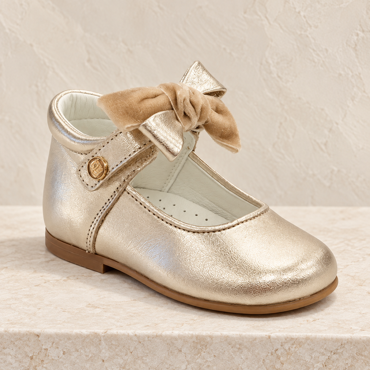 Andanines girls gold leather high-back shoe with layered camel velvet bow