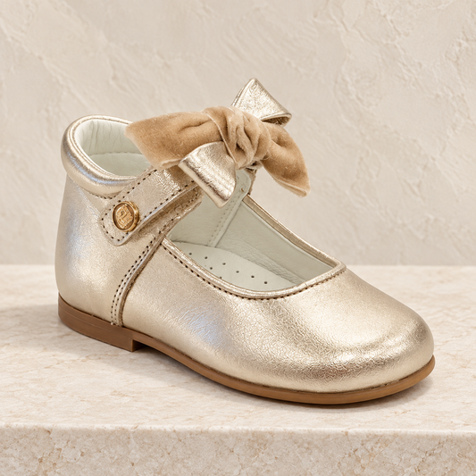 Andanines girls gold leather high-back shoe with layered camel velvet bow