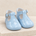 Andanines pale blue patent leather baby boys T-bar pram shoes on a warm ivory background
