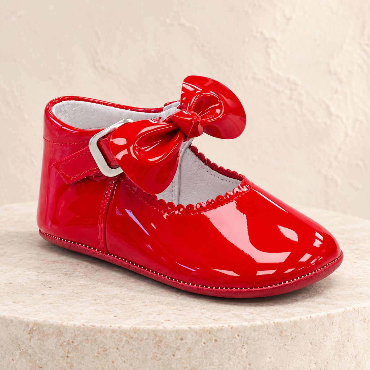Andanines red patent leather baby girls bow pram shoes