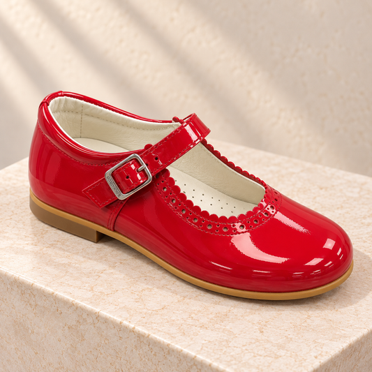 Andanines red pearl patent leather girls Mary Jane shoes with scalloped perforated detail and buckle strap