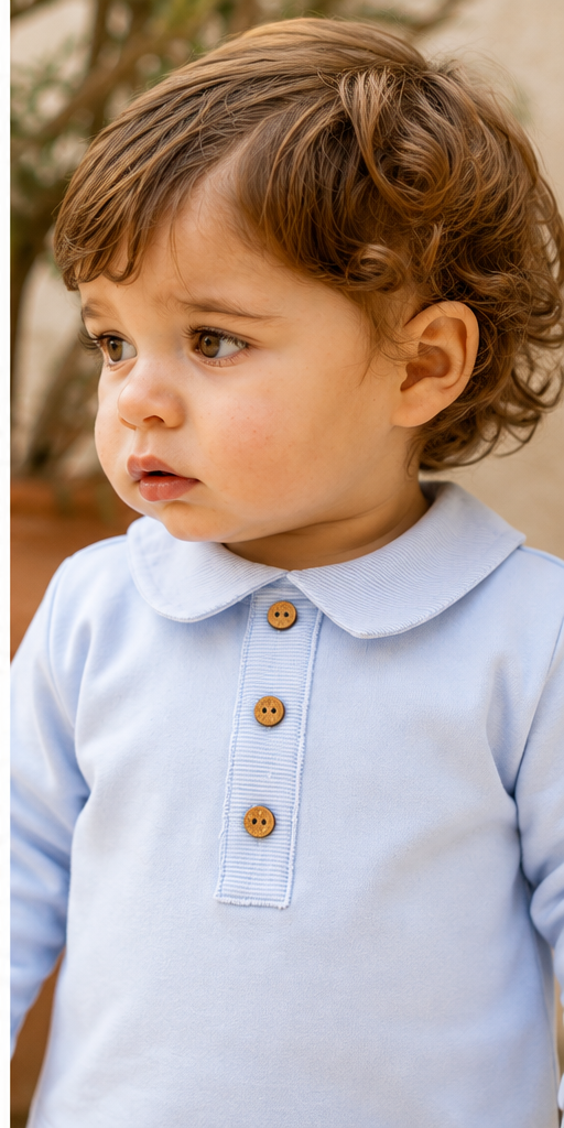Calamaro Lebeche boys pale blue top detail with Peter Pan collar and wooden button trim