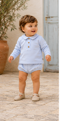 Calamaro Lebeche boys pale blue jam pant set worn by toddler standing in Mediterranean courtyard