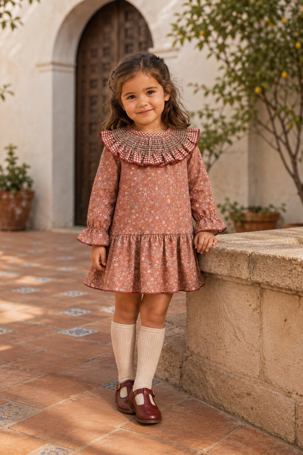 Calamaro Siroco terracotta floral dress with smocked gingham collar, three-quarter view