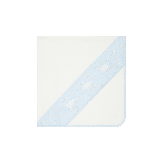 Deolinda Montana boys ivory quilted baby blanket with blue sheep print trim