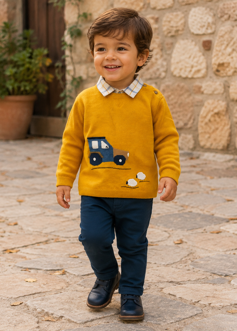 Boy wearing Mayoral mustard tractor jumper, checked shirt and navy trousers
