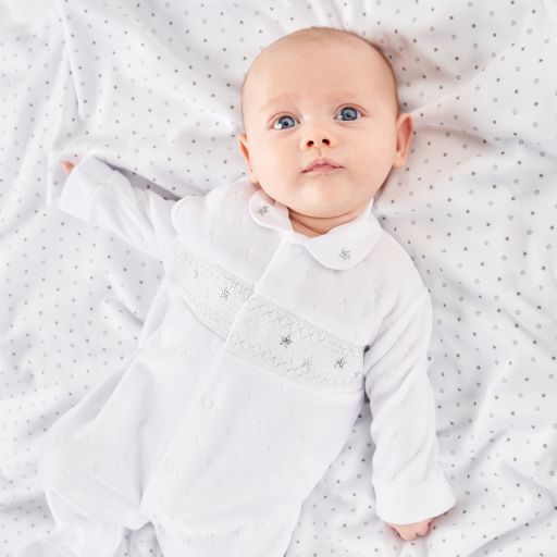 Dandelion white unisex star embossed cotton velour babygrow with silver star smocking and Peter Pan collar Lifestyle