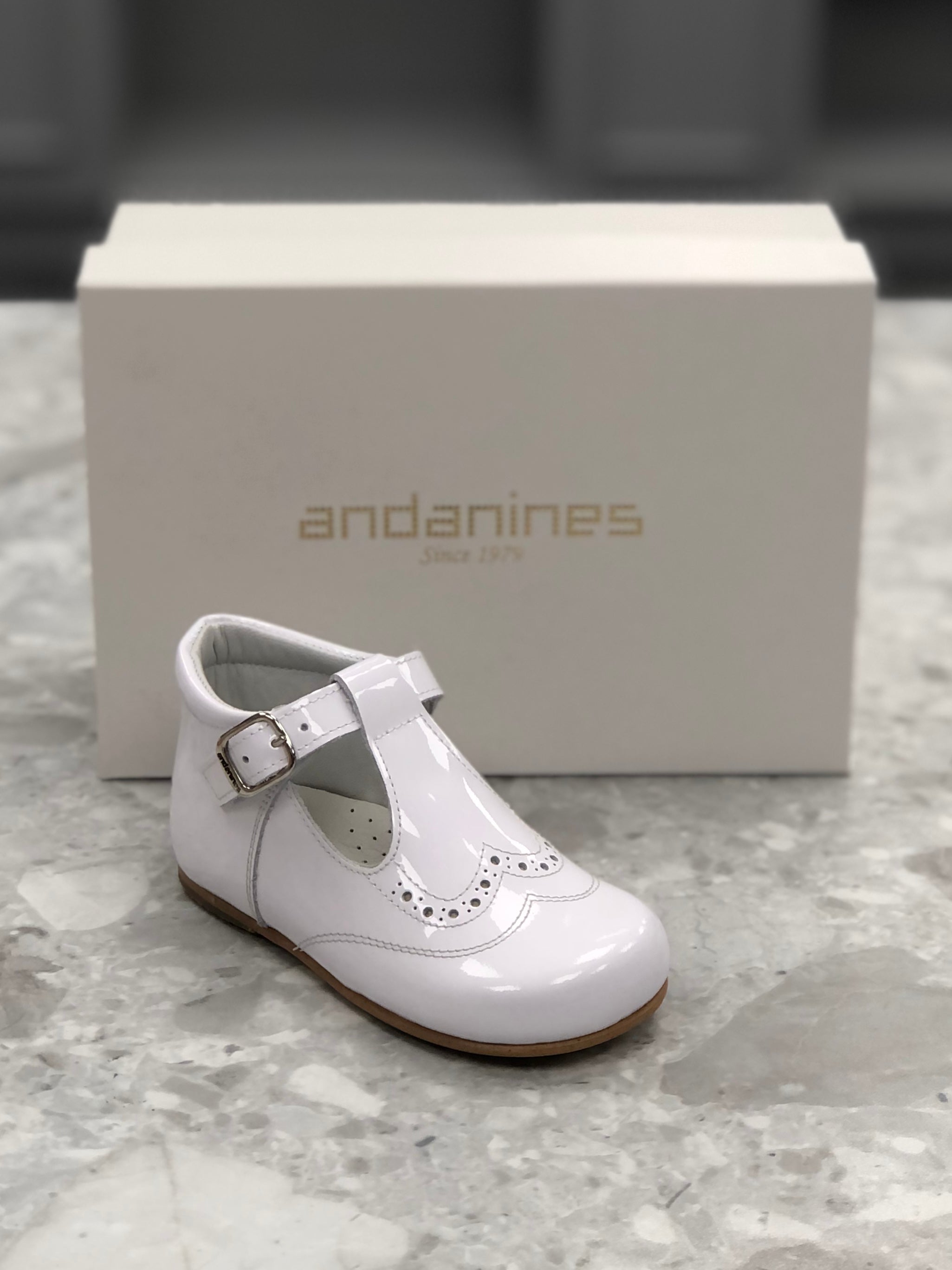 White t bar hot sale shoes infant