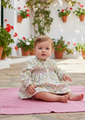 MAC ILUSION Disfrutar Pink Floral Dress — Baby seated on blanket